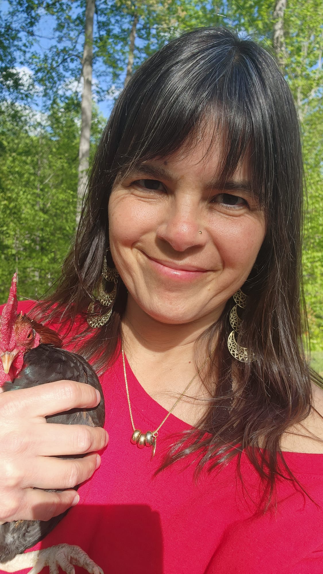 Briana with one of her homestead chickens